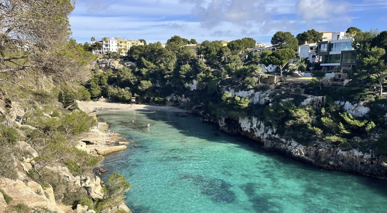 Cala Pi cove in Mallorca with calm crystal-clear water