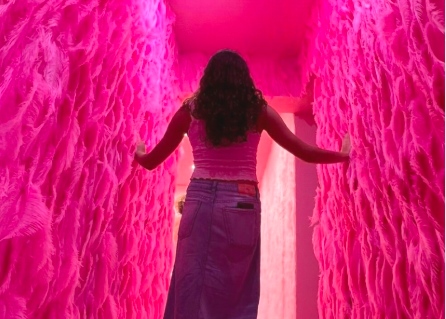 Solo traveler enjoying an immersive art experience in Mallorca inspired by modern travel trends.